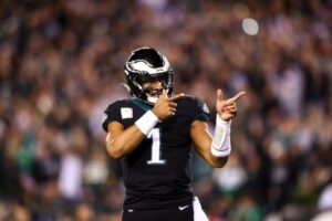 Hurts sets Eagles QB rushing record, passing Vick