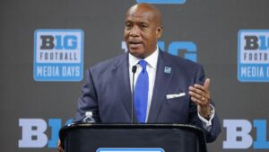 Sources: Warren bolts Big Ten for Bears CEO job