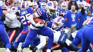 Bills honor Hamlin then open with kickoff TD