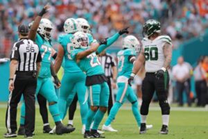 Dolphins hang on, earn 1st playoff spot since '16