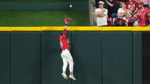 WATCH: Reds' TJ Friedl saves game with ninth-inning home run robbery to stun Brewers