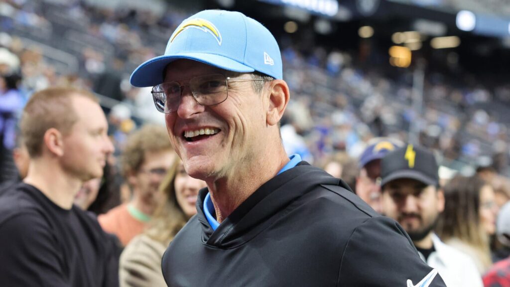 Jim Harbaugh pokes fun at John Harbaugh, Cal Ripken Jr. after foul ball lands between Baltimore sports icons
