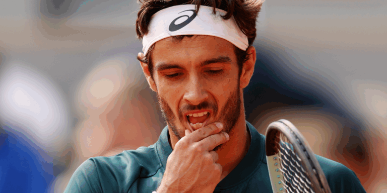 French Open: Lorenzo Musetti beats Francis Tiafoe despite kicking ball at judge for unsportsmanlike warning