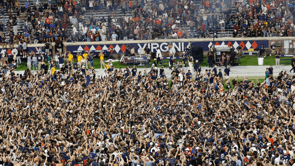 Field storming after Virginia's upset win over FSU leads to 19 people being treated for injuries