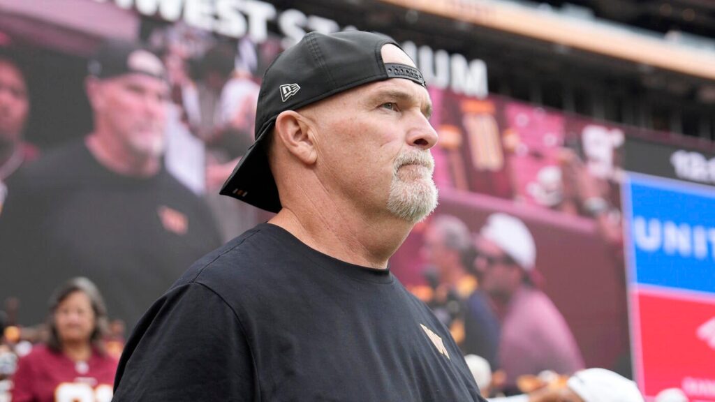 WATCH: Commanders coach Dan Quinn bloodied after sideline collision with Marcus Mariota