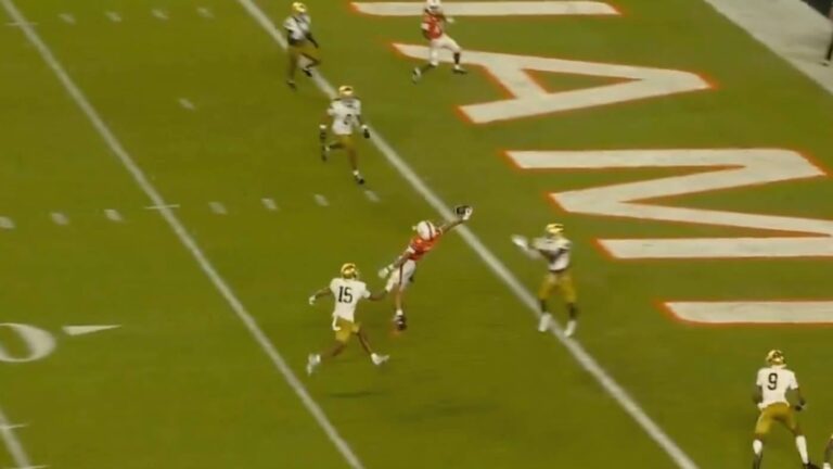 WATCH: Miami's CJ Daniels makes insane one-handed catch to turn potential Carson Beck interception into score