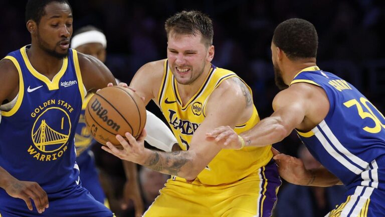 Luka Dončić gets a bitter taste of life without LeBron James in Lakers' season-opening loss to Warriors