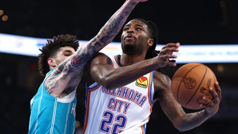 WATCH: Desperate, behind-the-glass basket from Thunder's Carson Wallace beats shot clock, leaves jaws on floor