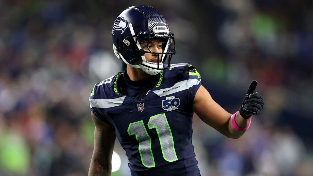 Watch: Official steps in to protect Seahawks WR Jaxon Smith-Njigba during Texans sideline scuffle