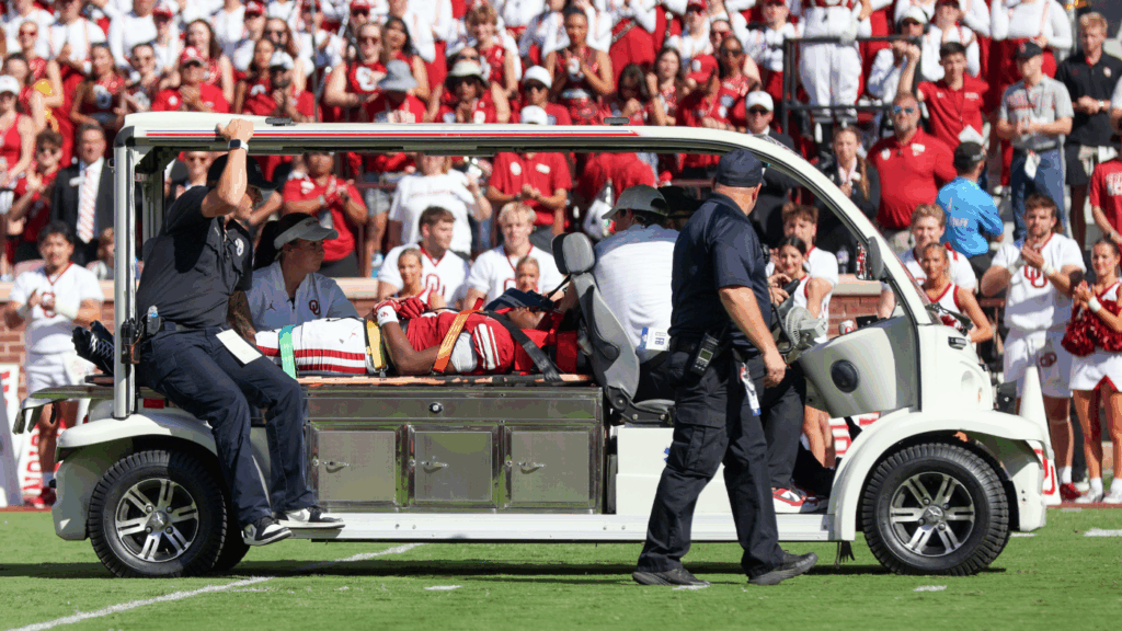 Oklahoma WR Keontez Lewis carted off field after brutal collision with brick wall behind end zone