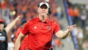 Louisville signs Jeff Brohm to contract extension: Cardinals coach signs new 8-year deal to stay at alma mater