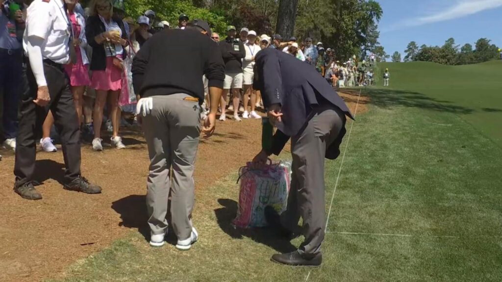 Xander Schauffele takes drop after driving ball into patron's merchandise bag in unique Masters moment