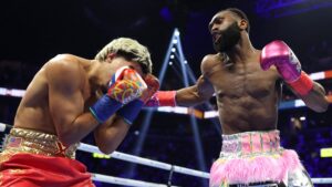 Jaron Ennis vs. Xander Zayas fight results: 'Boots' scores TKO in thriller to become unified 154-pound king