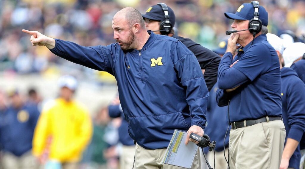 Ex-Michigan coach's lawsuit alleges school leaders covered up sign-stealing scheme ahead of 2023 title season