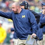 Ex-Michigan coach’s lawsuit alleges school leaders covered up sign-stealing scheme ahead of 2023 title season