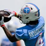 Former Titan’s ‘cheap’ hit on Wan’Dale Robinson sparks Bears fight in joint practice; WR tested for concussion