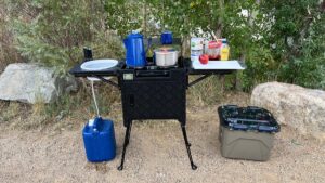 This All-In One Camp Kitchen Comes With Running Water at the Push of a Button