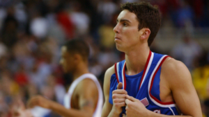 Successful Division II coach, former Kansas player, seriously injured after crashing car into bridge pillar