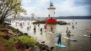 Witches Are Taking Over America’s Waterways on Paddleboards This Halloween